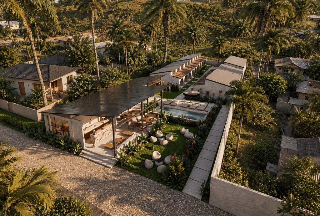 Vista aérea de Habitat CoLiving Kuta: estudios, piscina y pabellón del café en el jardín