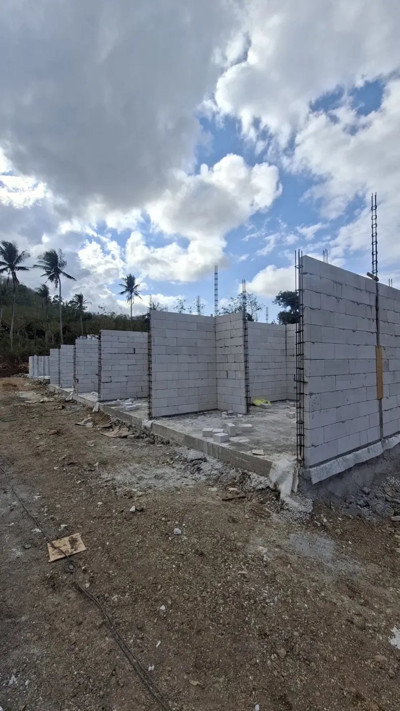 Unit walls under construction, September 2026