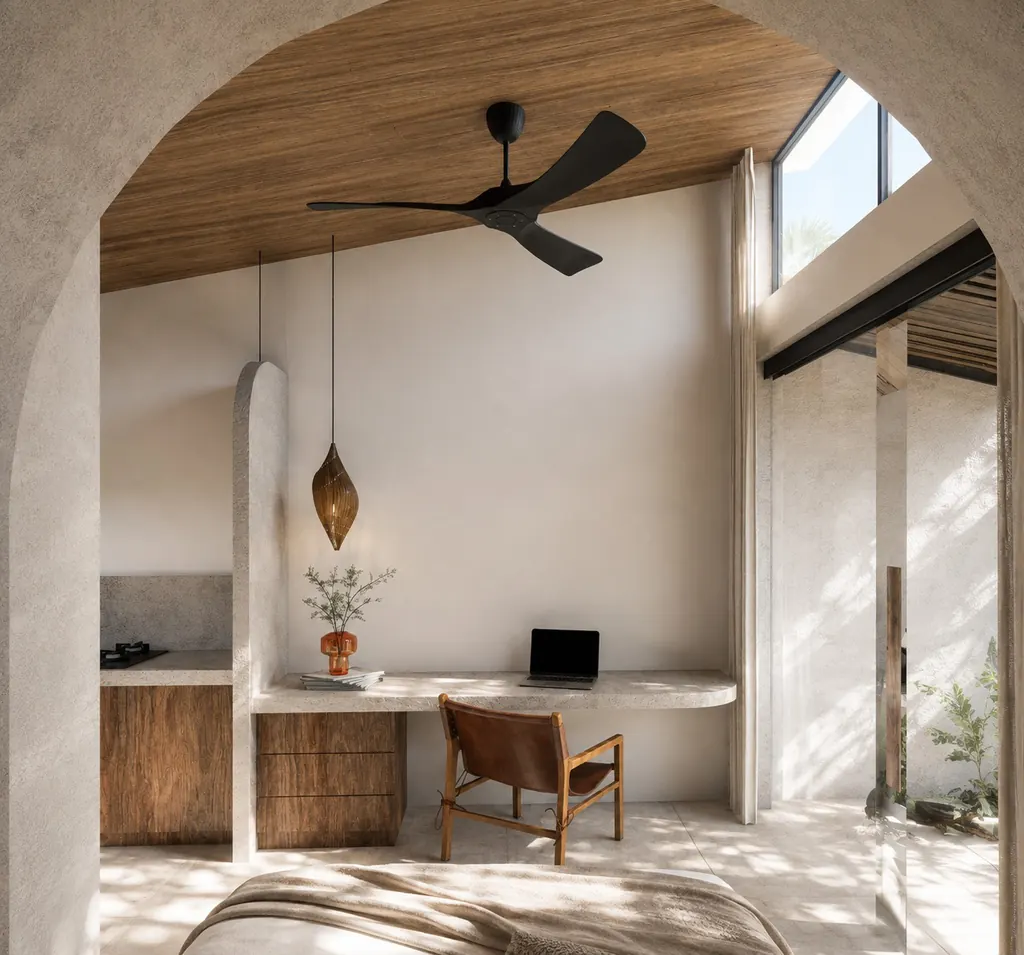 Arched living space with built-in desk