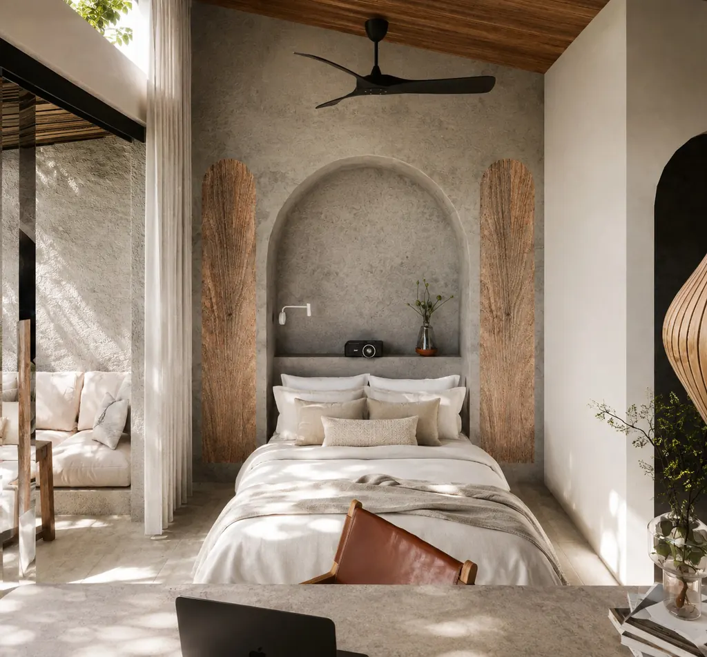 Studio bedroom with arched headboard niche